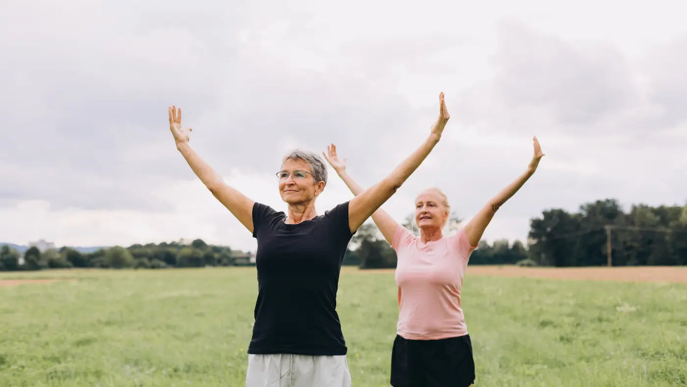 Elderly women exercising in the wild