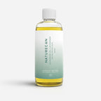 Bottle of Naturecan CBD Lavender Massage Oil with a white and green label.