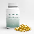 A bottle labeled "Naturecan CBD Softgels" with scattered capsules in front.