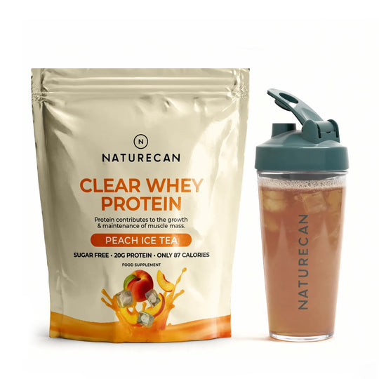 Packet of Fruity Whey Protein Isolate, Peach Ice Tea flavor, next to a shaker filled with a peach-colored drink.