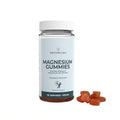 Bottle of Naturecan magnesium gummies with gummies on a white background