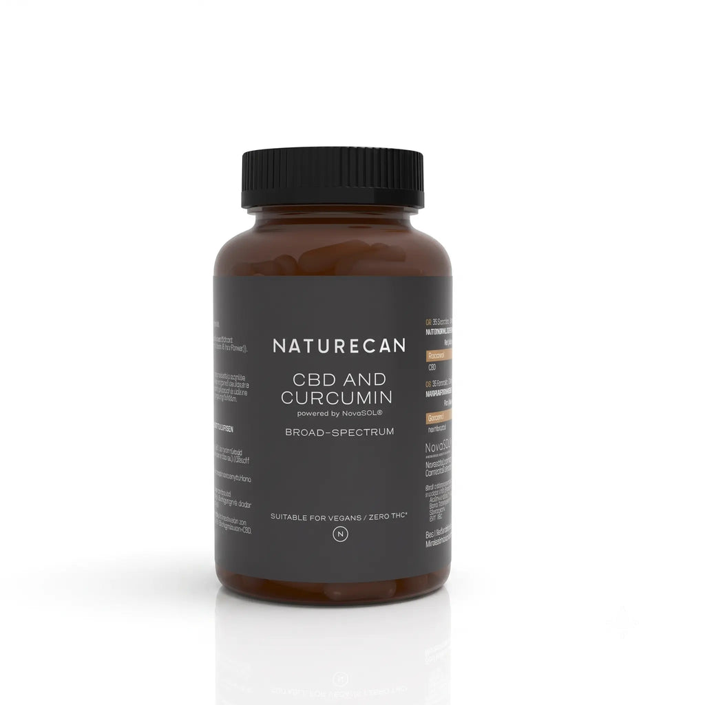 A brown amber bottle of Naturecan CBD and Curcumin dietary supplement with a black cap and dark label, shown on a clean white background with a soft reflection.