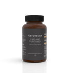 A brown amber bottle of Naturecan CBD and Curcumin dietary supplement with a black cap and dark label, shown on a clean white background with a soft reflection.