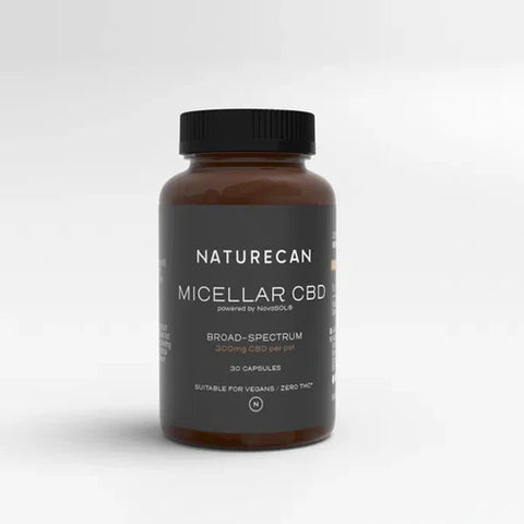 A brown bottle labeled "Micellar CBD" with a black cap, featuring 30 capsules and vegan-friendly text.