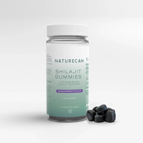Shilajit Gummies in a clear jar with a label showing blackcurrant flavor and 800mg per gummy.