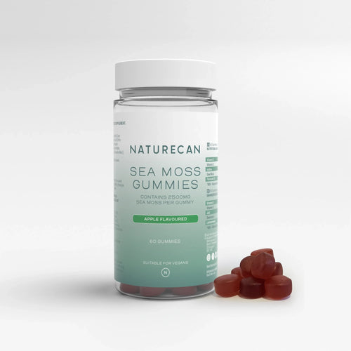Sea Moss Gummies in a clear jar labeled "Apple Flavoured" with a few gummies beside it.